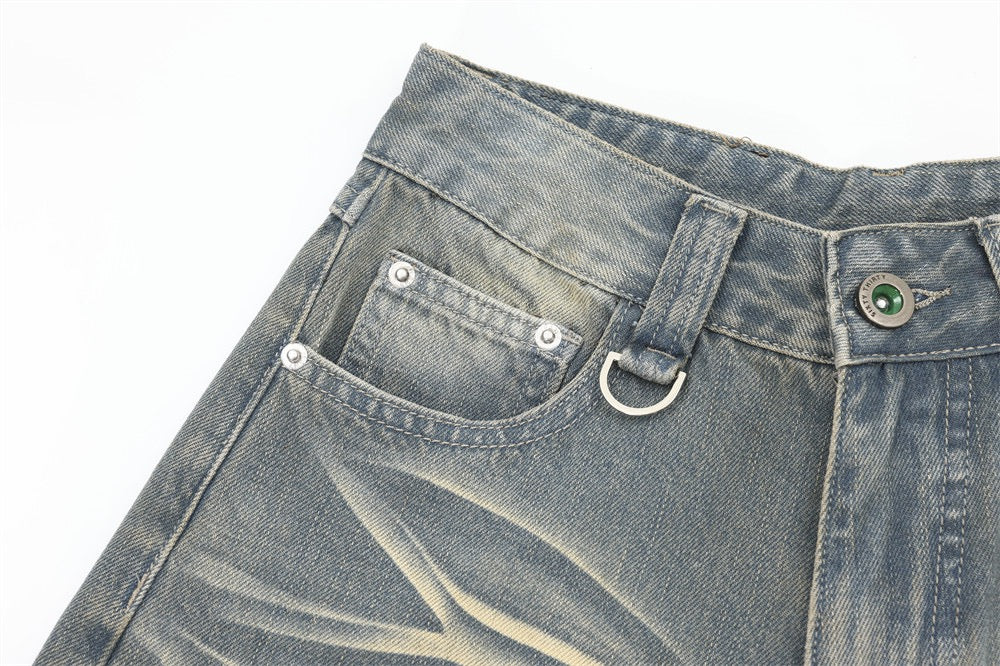 SATC PROJECT  cropped pants denim shorts with a whiskered wash and basic white creasing.