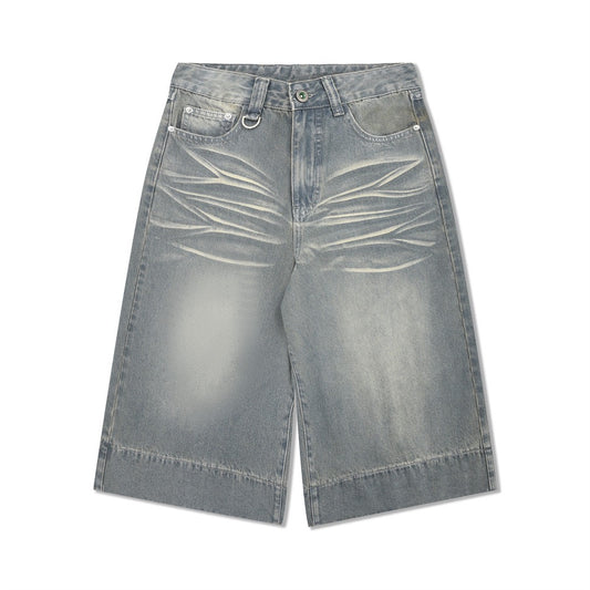 SATC PROJECT  cropped pants denim shorts with a whiskered wash and basic white creasing.