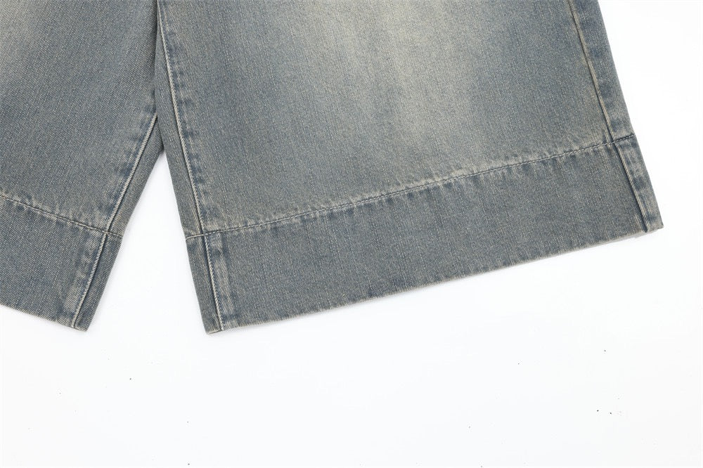 SATC PROJECT  cropped pants denim shorts with a whiskered wash and basic white creasing.